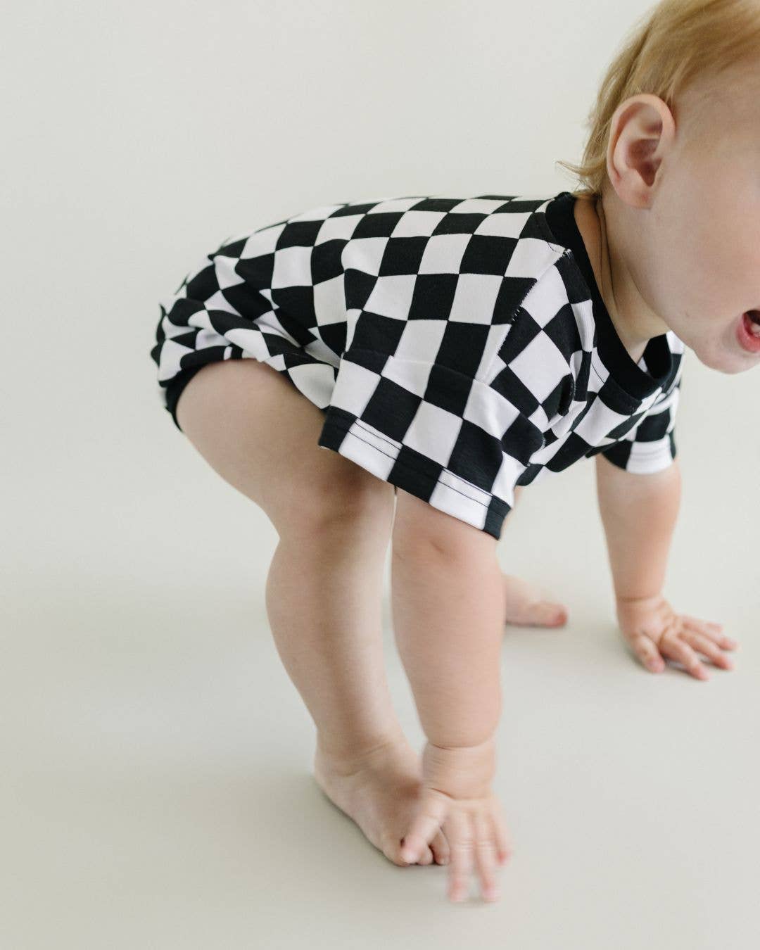 Short Sleeve Bubble Romper | Checkered Smiley Black