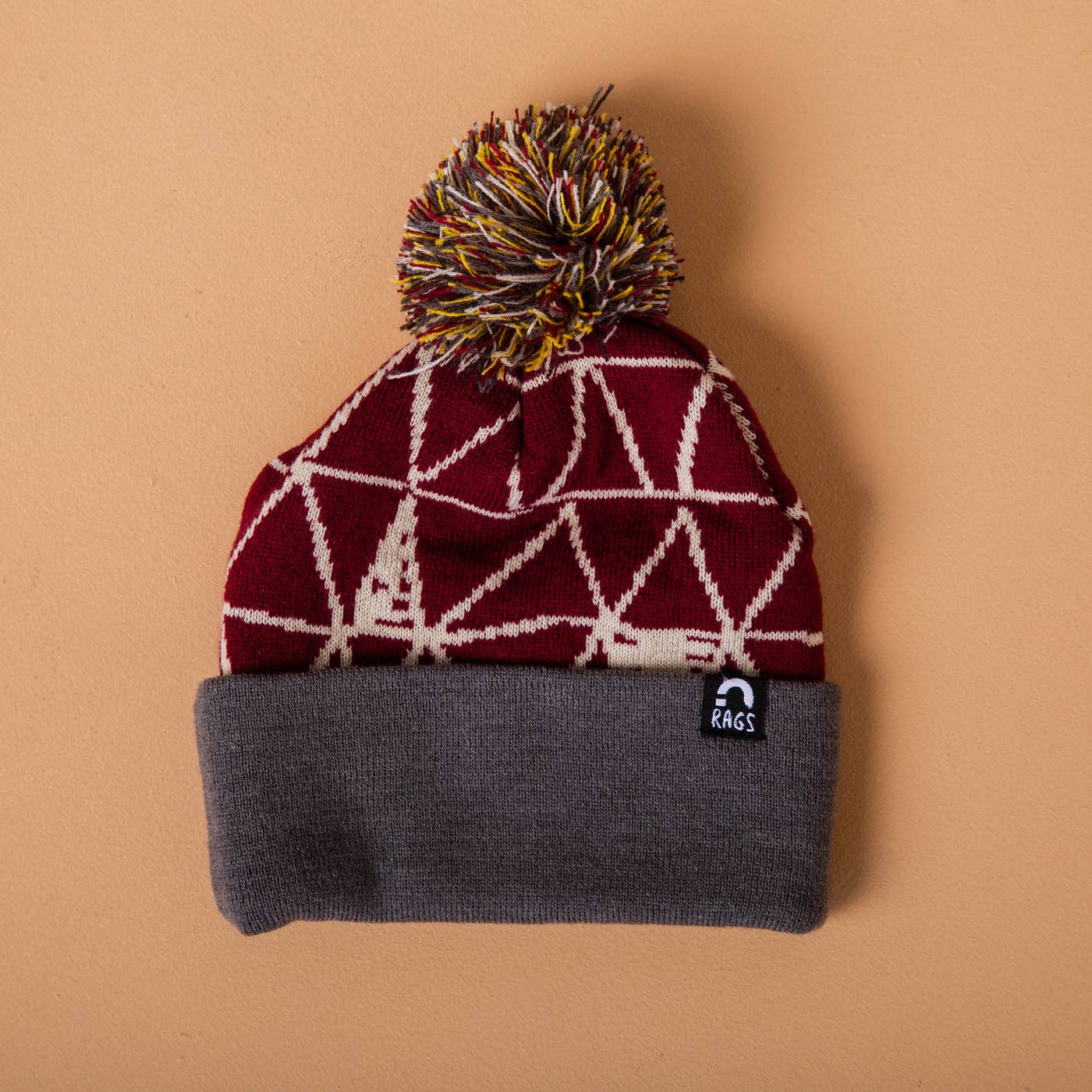 RAGS - Pom Beanie - 'Maroon Triangles'