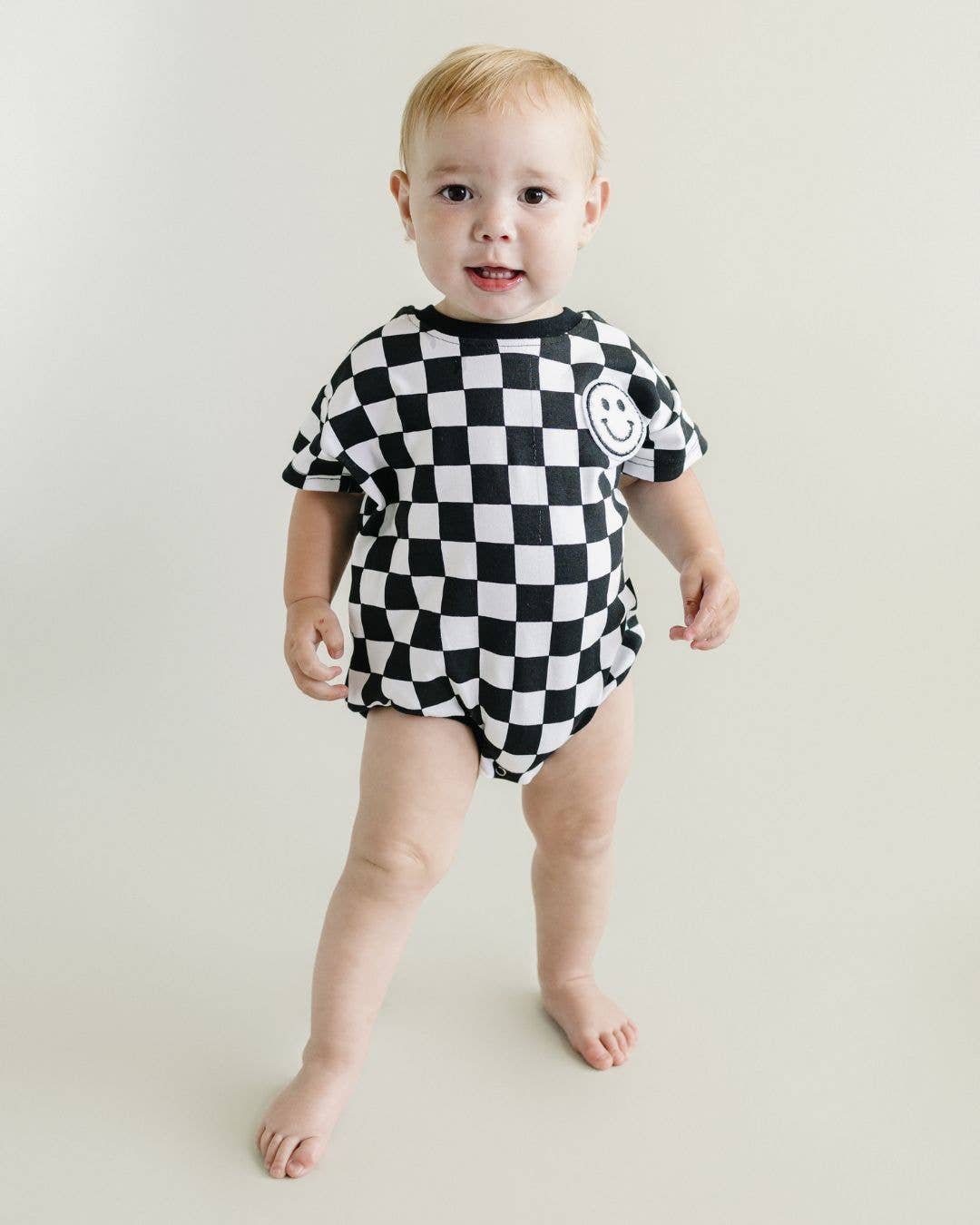 Short Sleeve Bubble Romper | Checkered Smiley Black